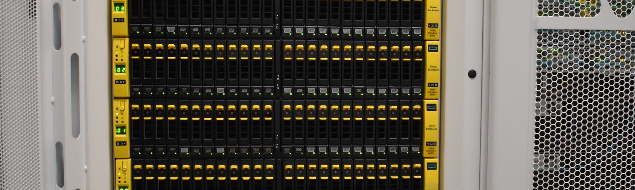 SSD drive carriers in our HPE 3PAR 8000 enclosures, yellow latches and green bay displays