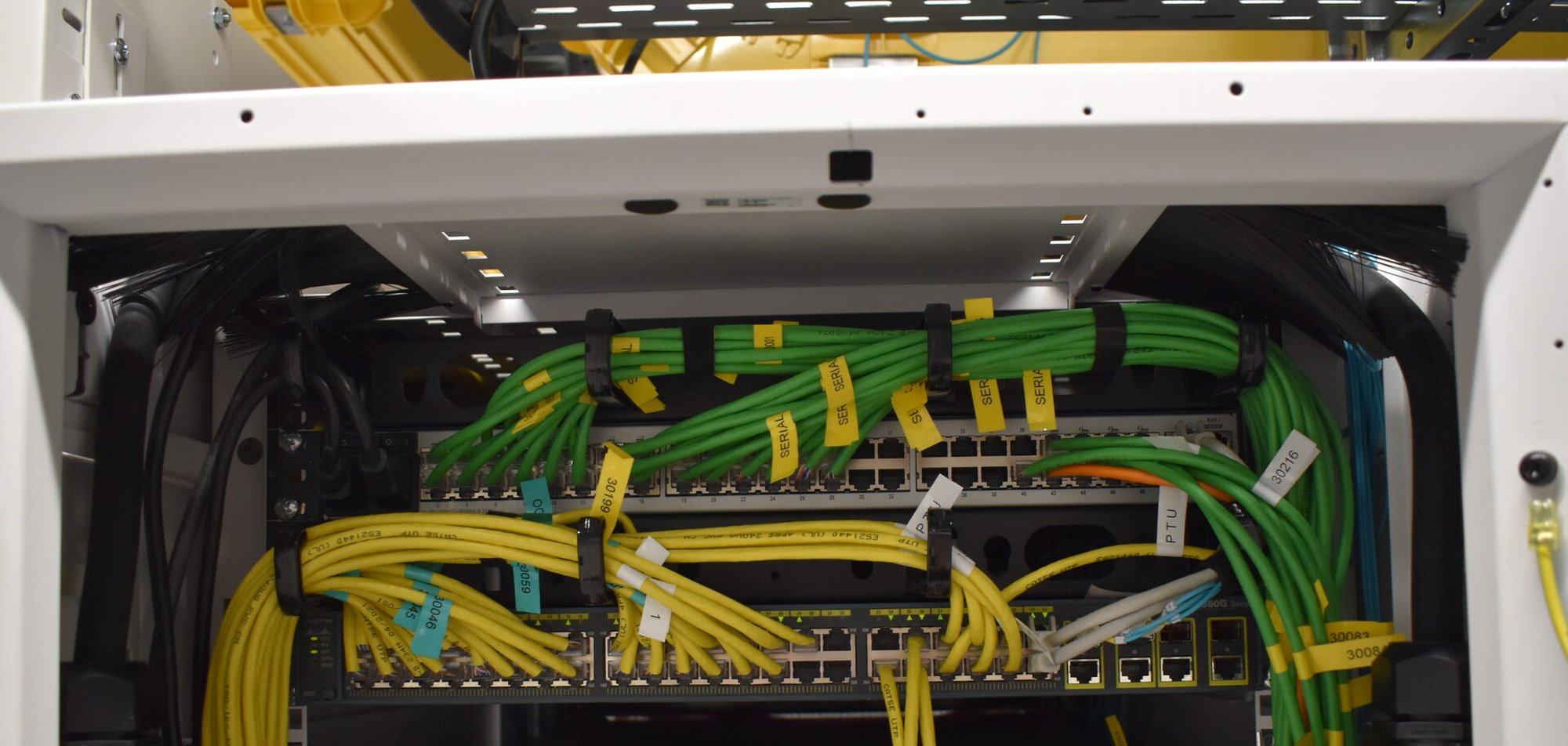 Rear of a EuroVPS network rack in Athens, with every cable labeled